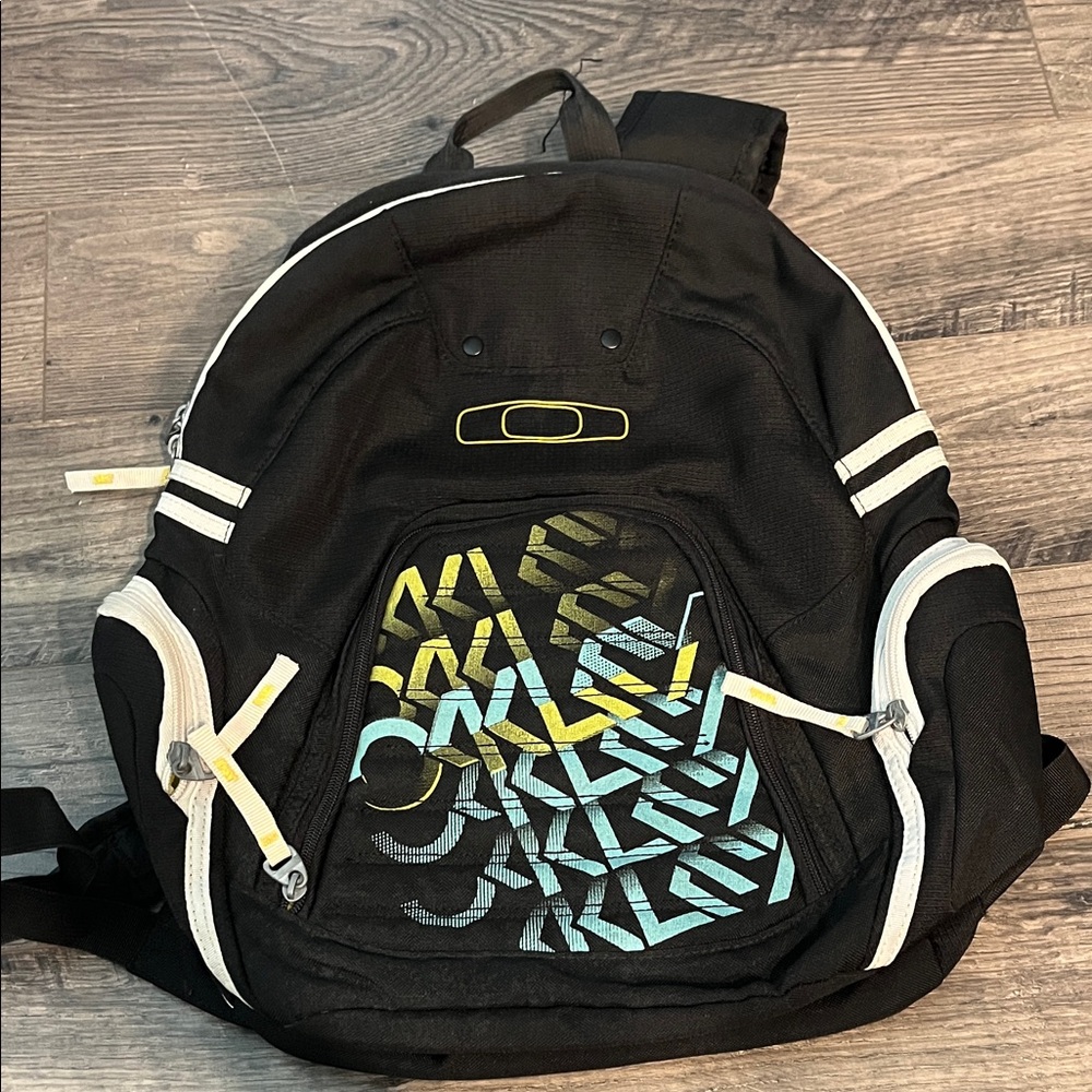 Oakley Black Backpack with Yellow and Blue Accents